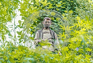 Kullu, Himachal Pradesh, India - August 06, 2018 : Farmer in Himalayas in Sainj, Kullu, Himachal, India