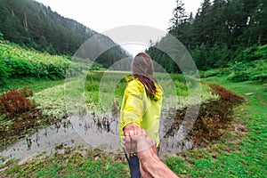 Kullu, Himachal Pradesh, India - September 02, 2018 : Grass covered punrik rishi lake surrounded by deodar tree