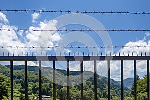 Kumabashiri Bridge, Ishikawa, Japan. The bars and barbed wire are to deter suicide attempts