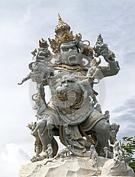 Kumbakarna Laga statue in Pura Uluwatu temple photo