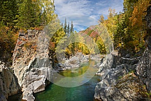 Kumir River flowing through the autumn Altai Mountains