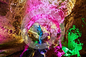 Kumistavi cave formations with stalactite highlighted. Kutaisi region, Georgia photo