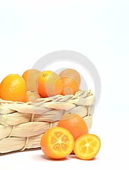 Kumquat fruits in a basket