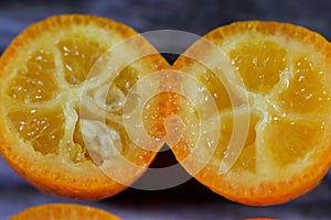 Kumquats, cumquats, a group of small, angiosperm, fruit-bearing trees in the family Rutaceae, golden orange, an edible fruit