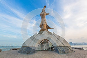 Kun Im statue, Gloden Statue of Guan Yin, the Goddess of Mercy in Taoism, Macau, China photo