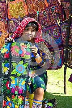 Kuna woman, Panama with traditional art works - Molas,