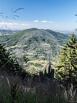 Kuncice pod Ondtejnikem village with Ondtejnik mountain ridge with Skalka hill above in Czech republic