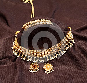 Kundan jewelry in black background photo