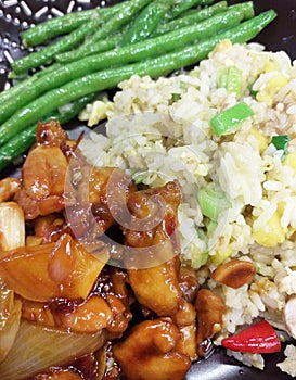 Kung Pao Chicken with Chinese Fried Rice and Stir Fried Long Green Beans.