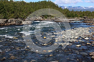 Kungsleden river in the arctic tundra. Abisko national park, Nothern Sweden