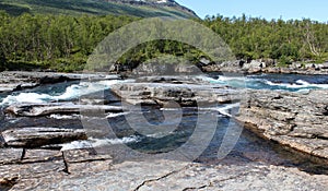 Kungsleden river in the arctic tundra. Abisko national park, Nothern Sweden