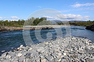 Kungsleden river in the arctic tundra. Abisko national park, Nothern Sweden