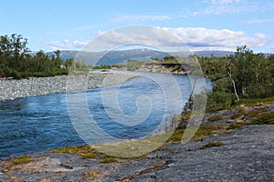 Kungsleden river in the arctic tundra. Abisko national park, Nothern Sweden