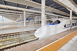 High-speed train departs from the station.