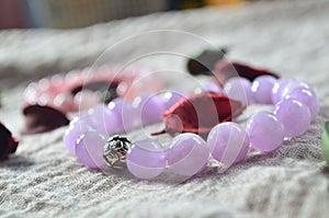 kunzite, Beads made of natural stone (mineral: kunzite). The diameter of the beads is 10 millimeters. photo