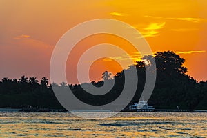 Kuramathi Maldives tropical paradise island sunset view from Rasdhoo