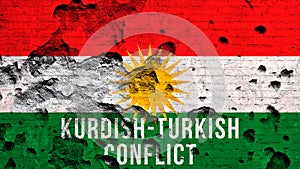 Kurdish-Turkish conflict background with flag of Kurdistan and text. War concept. Broken and damaged brick wall photo