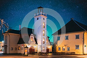 Kuressaare, Estonia. Close-up View Of Building Of Fire Bell Tower And Town Hall In Evening Illuminations. Amazing Bold