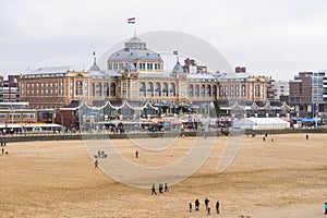 The Kurhaus along the boulevard with in front the beach of Scheveningen in the Netherlands