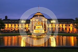 Kurhaus and Bowling Green in the evening with lights, Wiesbaden, Hesse, Germany