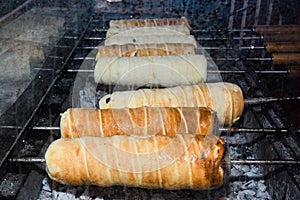 Kurtos kalacs or chimney cakes, preparing cooking