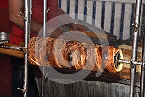 Kurtos kalacs or chimney cakes, preparing cooking