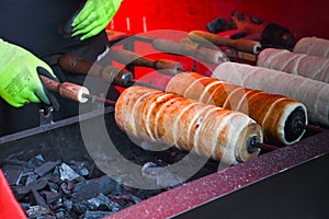 Kurtos kalacs or chimney cakes, preparing cooking