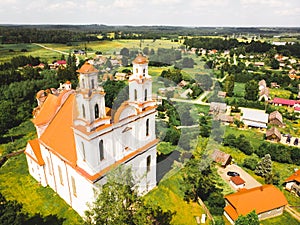 Kurtuvenai, Lithuania - 25th june, 2021: Aerial view St. Jacob the apostle church in Kurtuvenai town, with Lithuania countryside