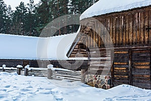 Kurzeme Peasant`s horseshoe-shaped cattle yard under snow
