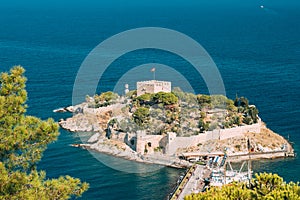 Kusadasi, Aydin Province, Turkey. Top View Of The Pigeon Island. Old 14th-15th Century Fortress On Guvercin Adasi In The