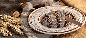 Kutia ceremonial grain dish with honey, raisins and poppy seeds. traditional meal in eve Christmas