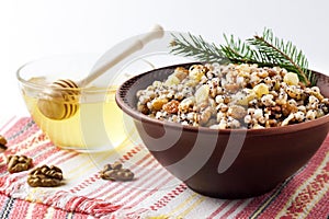 Kutia or kutya is a ceremonial grain dish with sweet gravy traditionally served by Eastern Orthodox Christians