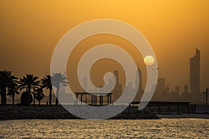 Kuwait city sunset in dusty weather