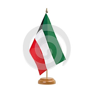 Kuwait Flag, small wooden kuwaiti table flag, isolated on white background photo