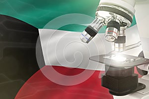 Kuwait science development concept - microscope on flag background. Research in chemistry or nanotechnology 3D illustration of