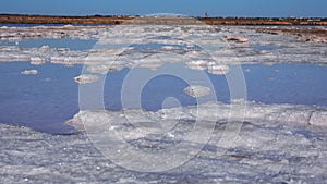 Kuyalnik estuary, Black Sea. Self-precipitating salt at the bottom and bank of the estuary. Table salt crystals