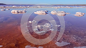 Kuyalnik estuary, Black Sea. Self-precipitating salt at the bottom and bank of the estuary. Table salt crystals