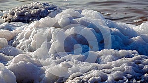 Kuyalnik estuary, Black Sea. Self-precipitating salt at the bottom and bank of the estuary. Table salt crystals