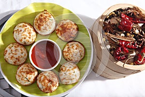 kuzhipaniyaram. pan fried cakes. gunta. ponganalu.guliyappa. yeriyappa, gundponglu, bugga, ku?i paniyaram.