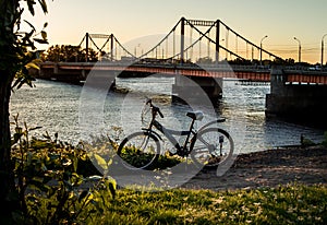 Kuznechevskaya bridge in Arkhangelsk at sunset.