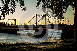 Kuznechevskaya bridge in Arkhangelsk at sunset.