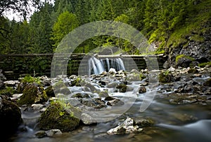 Kvaciansko-Prosiecka valley, Mlyny - Oblazy, Slovakia: a stones under small waterfall at the water mill in the village