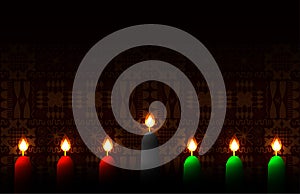 Kwanzaa. Concept of an African American festival in the United States. 7 candles of traditional colors. Ethnic patterns on the