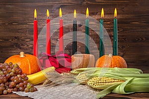 Kwanzaa festival concept with seven candles red, black and green