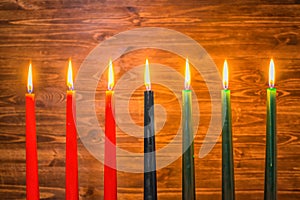 Kwanzaa festival concept with seven candles red, black and green
