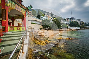 The Kwum Yam Shrine and rocky coast at Repulse Bay, in Hong Kong