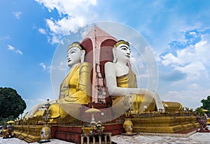 Kyaik Pun pagoda of big four Buddha statues in Bago , Myanmar. photo