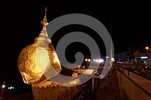 Kyaikhtiyo Pagoda at dusk in Myanmar. They are public domain or treasure of Buddhism, no restrict in copy or use. photo