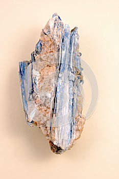 Kyanite-raw on a Pink Background