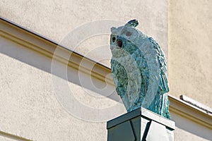 KYIV, KIEV, UKRAINE - 20 September 2020: Bronze owl - an element of decoration of the entrance gate on Andreevsky spusk Andrew`s photo